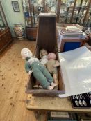 Vintage rocking crib and two pot and one celluloid dolls.