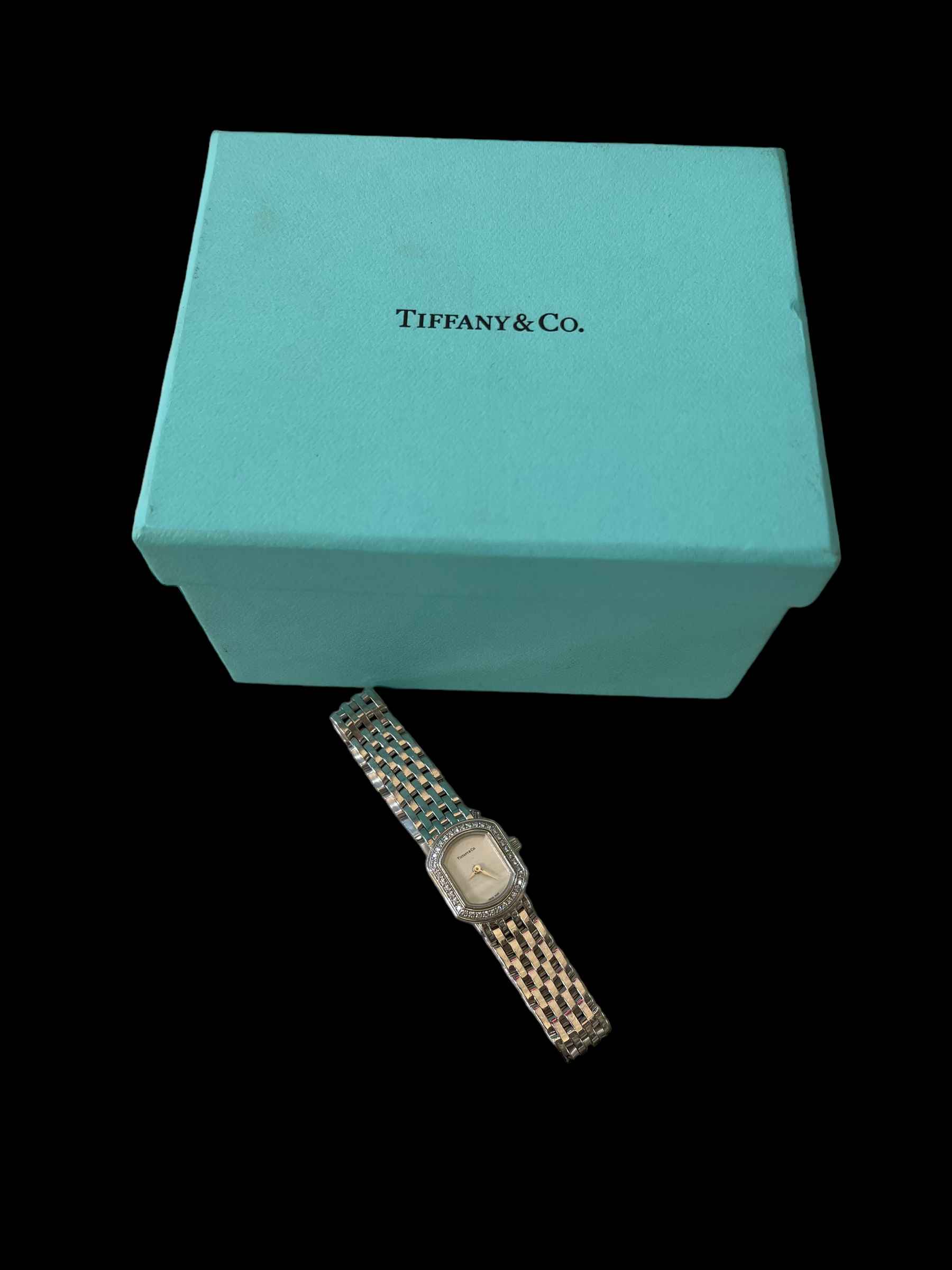 Tiffany diamond set 18 carat white gold bracelet watch, with outer box.