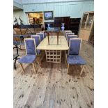 Danish Skovby eleven piece dining suite comprising four door illuminated cabinet 196cm by 107cm by