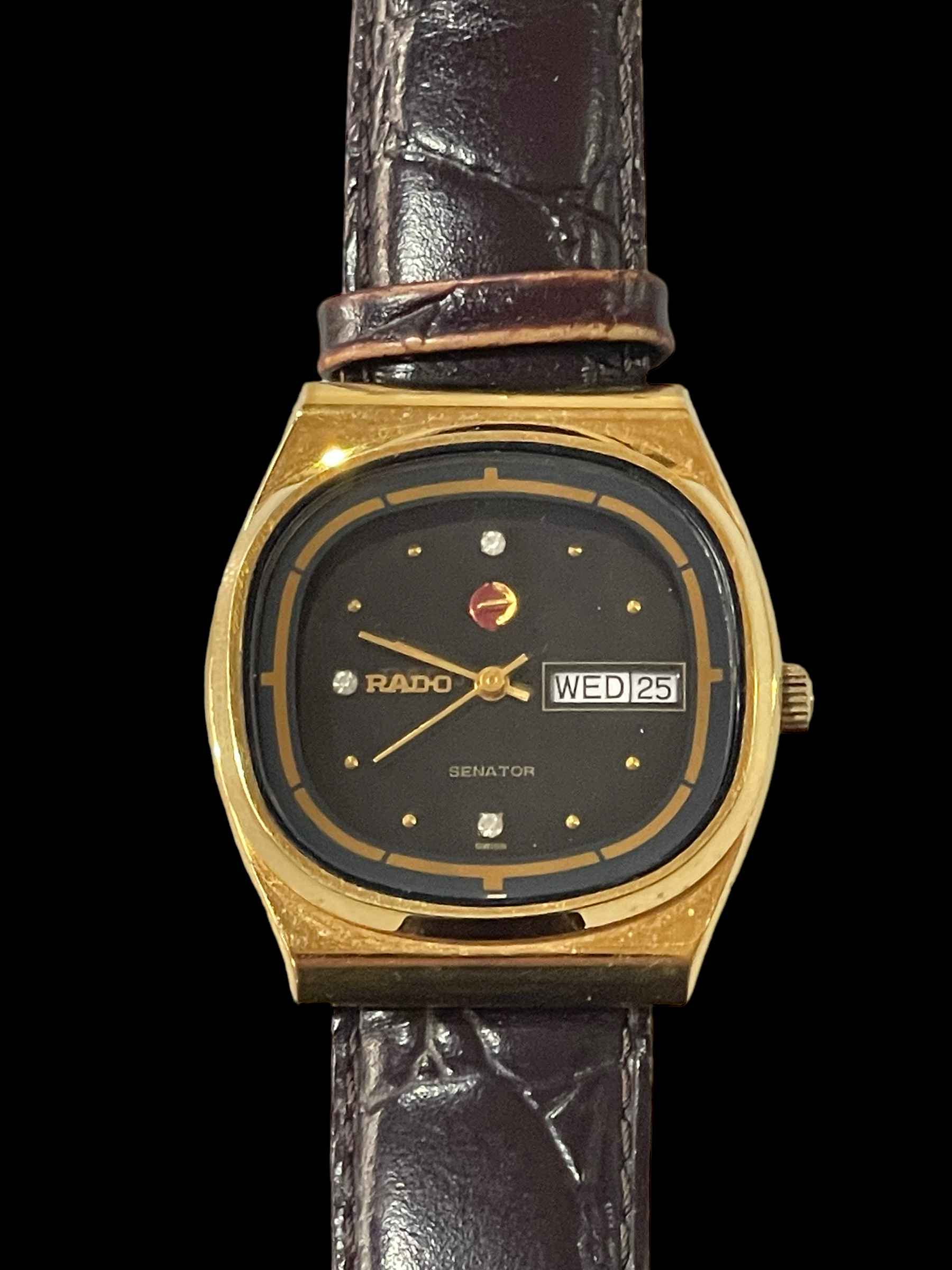 Vintage gents Rado Senator day date wrist watch.