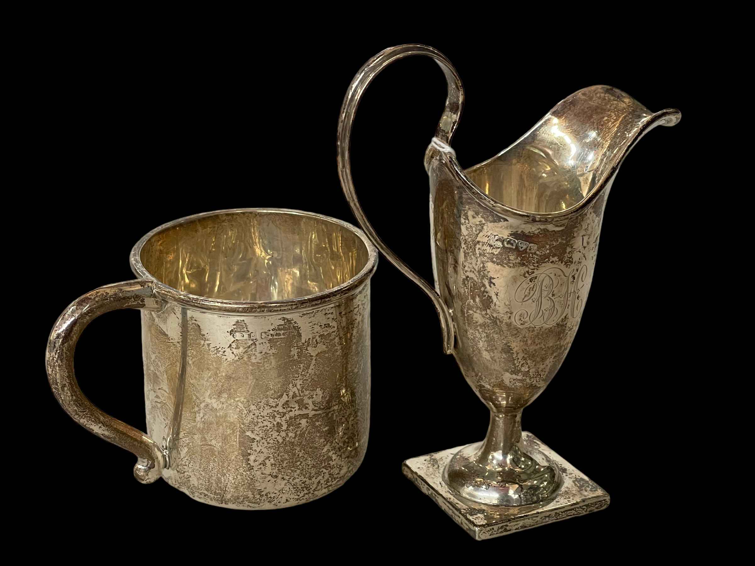 Chester hallmarked helmet cream jug 1907 and silver christening mug (2).
