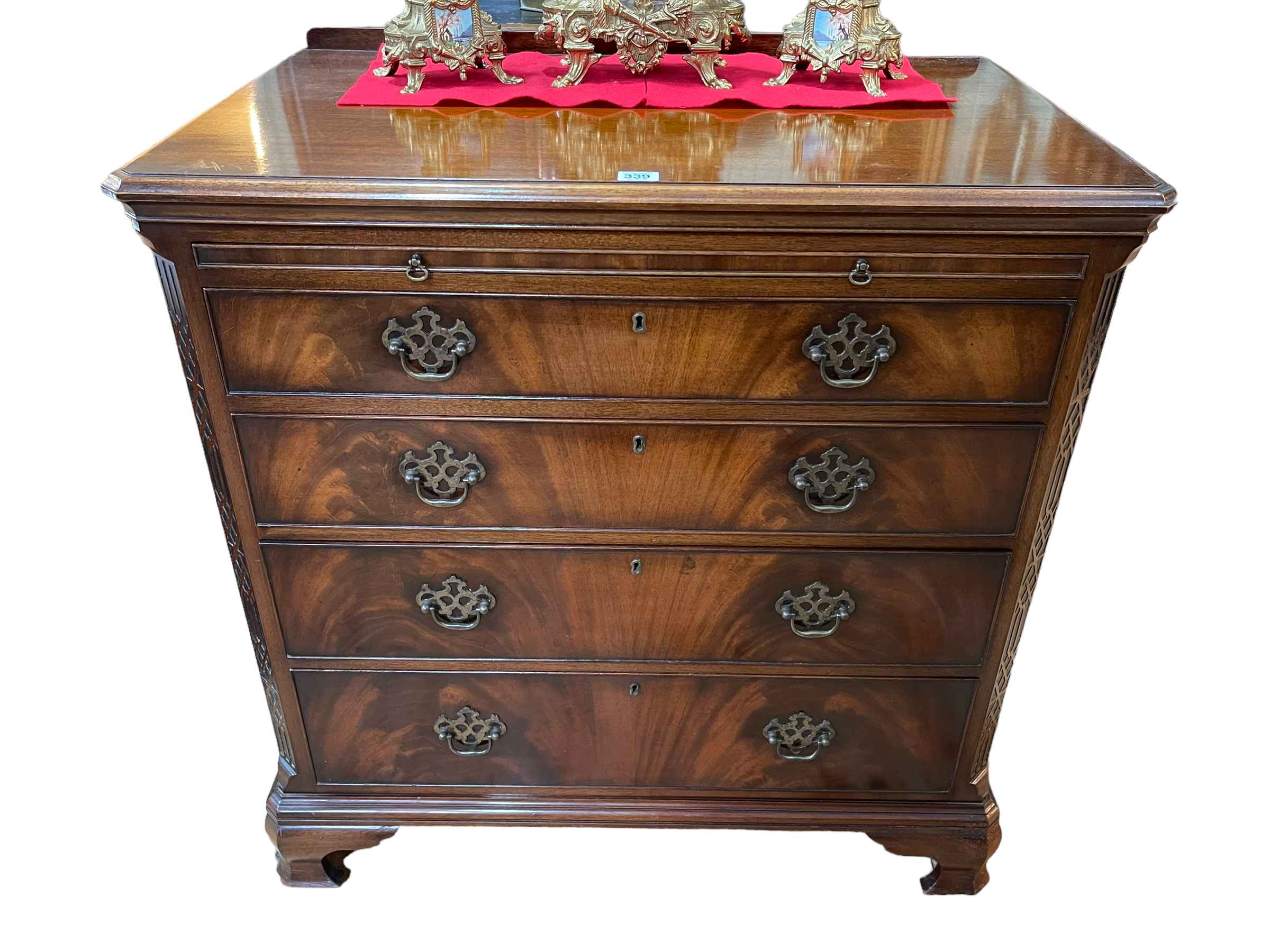 Georgian style mahogany chest of four long graduated drawers having brush slide,