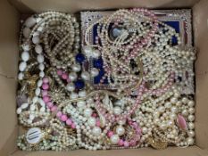 Box of jewellery and photograph frame.