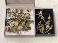 Collection of watch keys, cufflinks and studs.