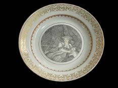 Chinese export saucer dish with monochrome shepherdess decoration, 23cm.