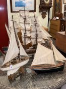 Large model galleon and two pond yachts.