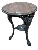 Circular cast base Britannia pub table, 71cm by 60cm diameter.