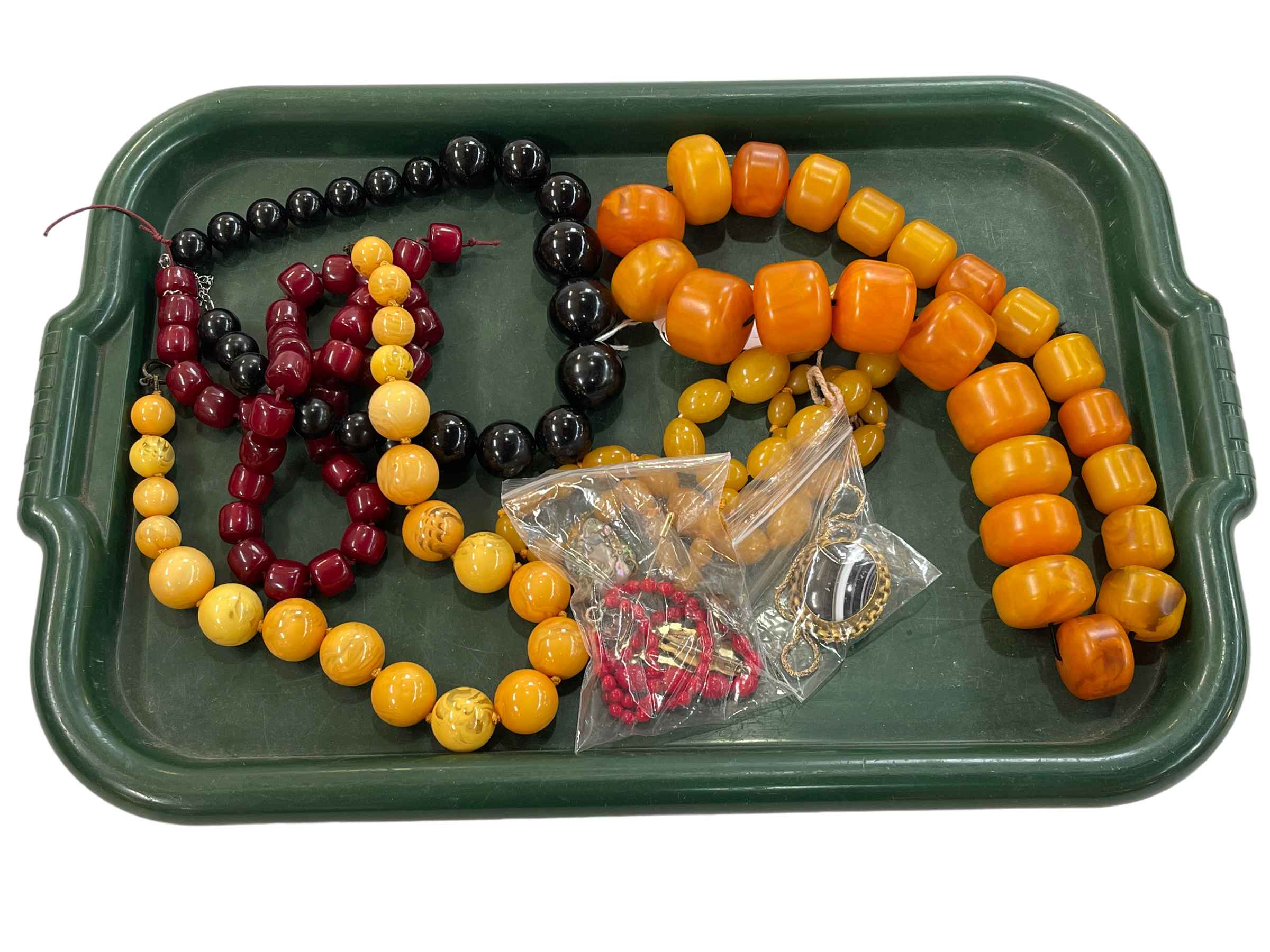 Bead necklaces, agate brooch, (amber?), etc.