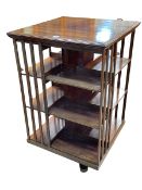 Mahogany three tier revolving bookcase, 103.5cm by 64cm by 64cm.