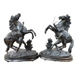 Pair of Victorian spelter marley horses, 46cm high.