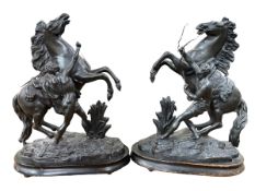 Pair of Victorian spelter marley horses, 46cm high.