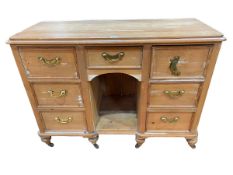 Seven drawer pine dresser with lower central open compartment, 81cm by 109cm by 47cm.