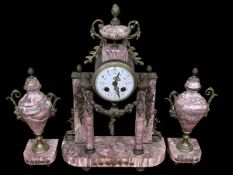 Three piece marble and gilt clock garniture.