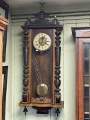 Victorian walnut Vienna style pendulum wall clock.