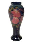 Moorcroft finch and fruit vase, 28cm high.