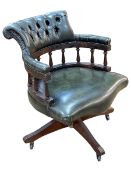 Bottle green buttoned leather Captains style swivel desk chair.