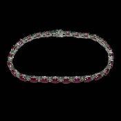 18 carat white gold, ruby and diamond bracelet,