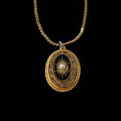 9 carat gold chain necklace with costume pendant.