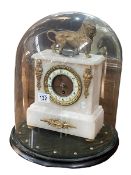 Victorian ornate gilt and onyx mantel clock with a lion crest under a glass dome, 40cm high.