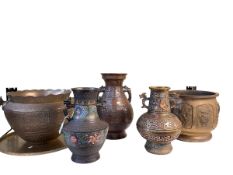 Three bronze vases, jardiniere with elephant mask handles, brass jardiniere and tray.