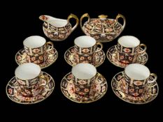 Royal Crown Derby Imari coffee set with six coffee cans and saucers, sugar and cream jug (14).