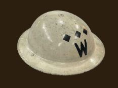 WWII British Military helmet with cream painted finish and a 'W' (Warden).