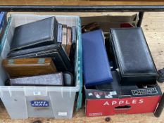 Two boxes of cutlery boxes.