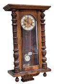 Victorian walnut Vienna style pendulum wall clock, 90cm.