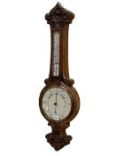 Victorian carved oak aneroid barometer-thermometer.
