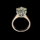 18 carat white and yellow gold solitaire ring, the brilliant cut natural diamond totalling 4.