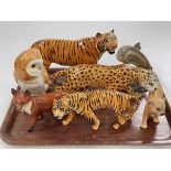 Seven Beswick pieces including 1032 Trout, Tigers, Lion, etc.