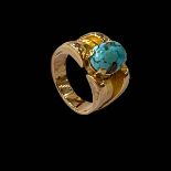 Turquoise set 18 carat gold ring, size M.