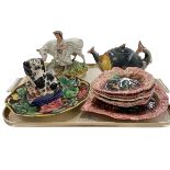 Majolica dishes, fish teapot and two Staffordshire pieces.