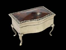 Silver and tortoiseshell serpentine front ring box on cabriole legs, Birmingham 1912, 8cm wide.