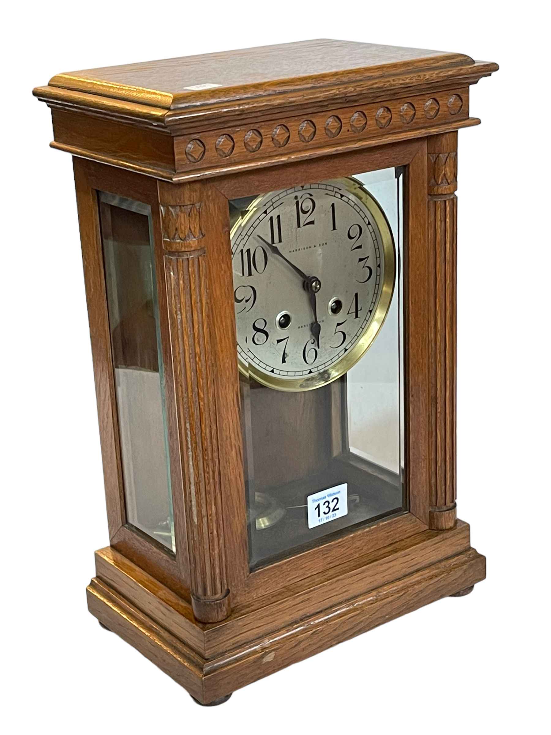 Vintage oak bracket clock with silver dial marked Harrison & Son, Darlington, 36cm.