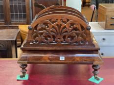 19th Century rosewood Canterbury with fretwork sides above single drawer on turned legs and brass