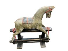 Vintage wooden rocking horse on safety stand, for restoration, 85cm by 83cm.