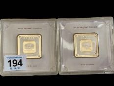 Two Geiger silver bars in plastic cases.