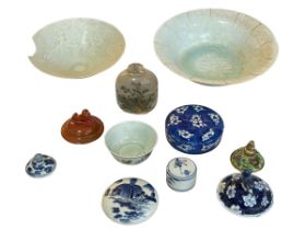 Two Chinese bowls, small tea bowl, opium bottle and assortment of china lids.