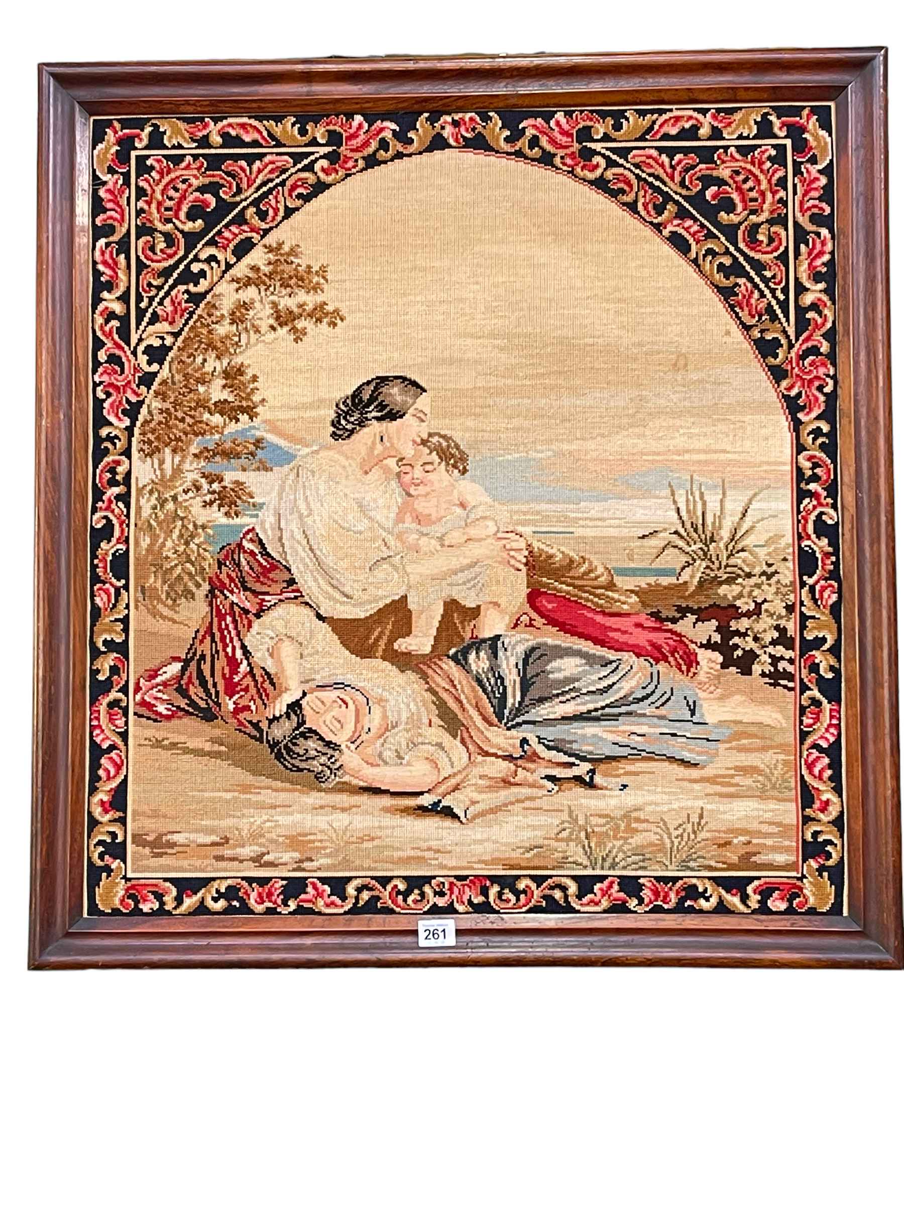 19th Century mahogany framed needlework depicting mother and children, 80cm by 75cm.