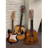 Two Encore acoustic guitars and Pitchmaster electric guitar.