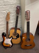 Two Encore acoustic guitars and Pitchmaster electric guitar.