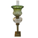 Vintage brass columned oil lamp with green shade, 74cm.