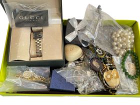 Box of jewellery including silver and a Gucci wristwatch.