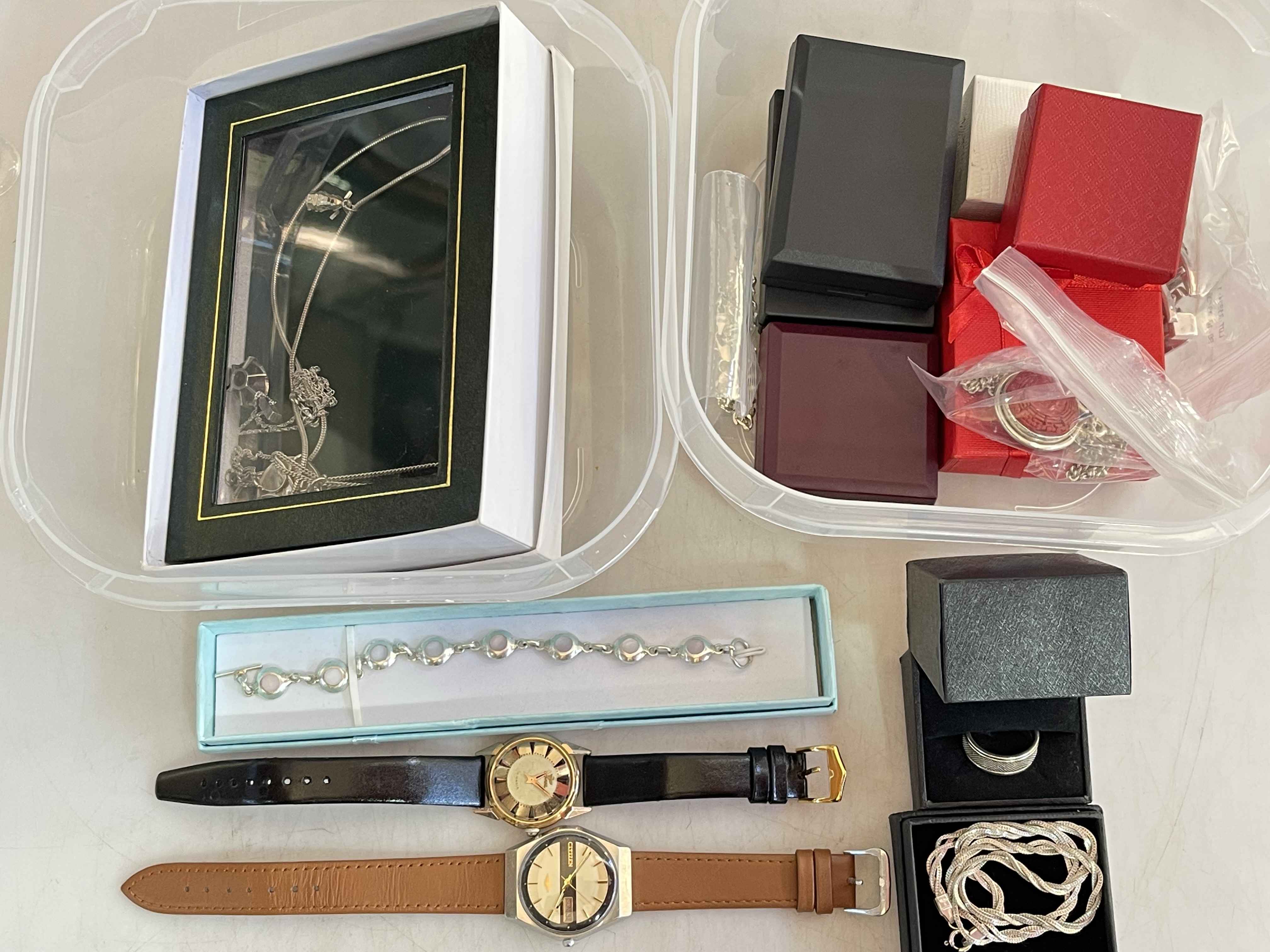 Collection of jewellery including silver and two wristwatches.