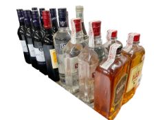 Sixteen bottles of wine and spirits including 103 Osborne Whisky 1 litre, Grants 1 litre,