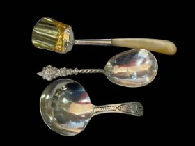 Three 19th Century caddy spoons dated 1806, 1807 and 1884.