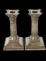 Pair Victorian silver corinthian column candlesticks with removable nozzles, London 1897, 15.5cm.