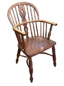 Antique Windsor pierced splat back elbow chair with crinoline stretcher.