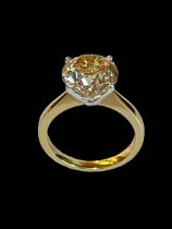 18 carat yellow gold solitaire diamond ring with certificate, the round brilliant cut diamond 4.